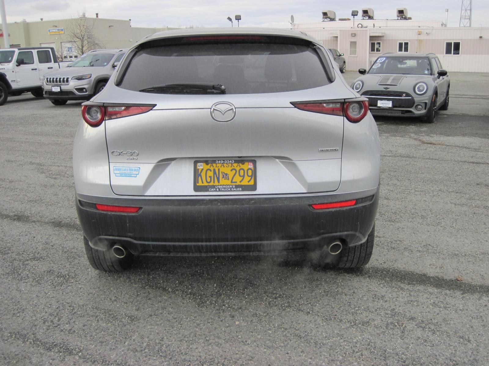 2021 silver /black Mazda CX-30 select AWD (3MVDMBBL3MM) with an 2.5L L4 DOHC 16V engine, 6A transmission, located at 9530 Old Seward Highway, Anchorage, AK, 99515, (907) 349-3343, 61.134140, -149.865570 - Photo #4